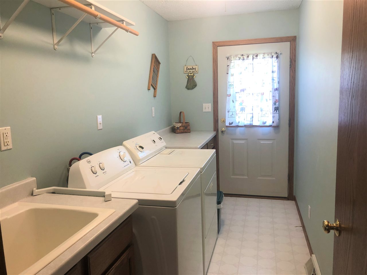 6652 North Cedar Road Forreston, IL 61030 - Photo 8 of 25 a utility room with dryer and washer