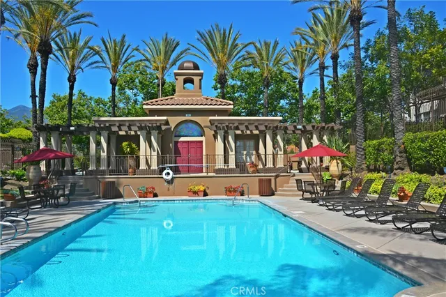 an outdoor space with lots of swings and slides