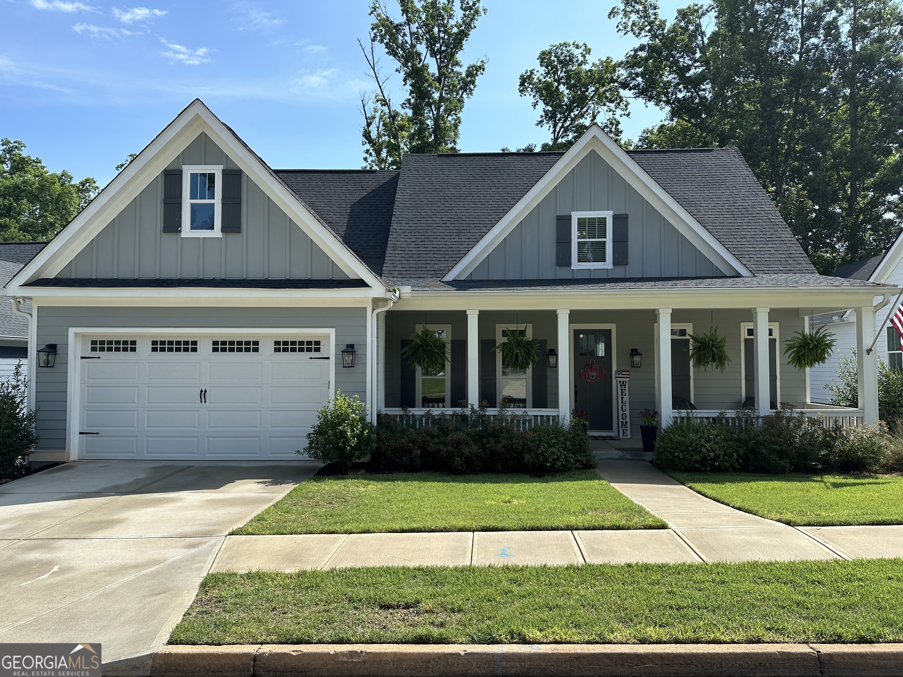 764 Markhams Drive Madison, GA 30650 - Photo 1 of 1 a front view of a house with garden
