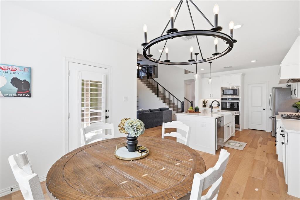 2171 Cloverfern Way Haslet, TX 76052 - Photo 12 of 38 a view of a dining room with furniture