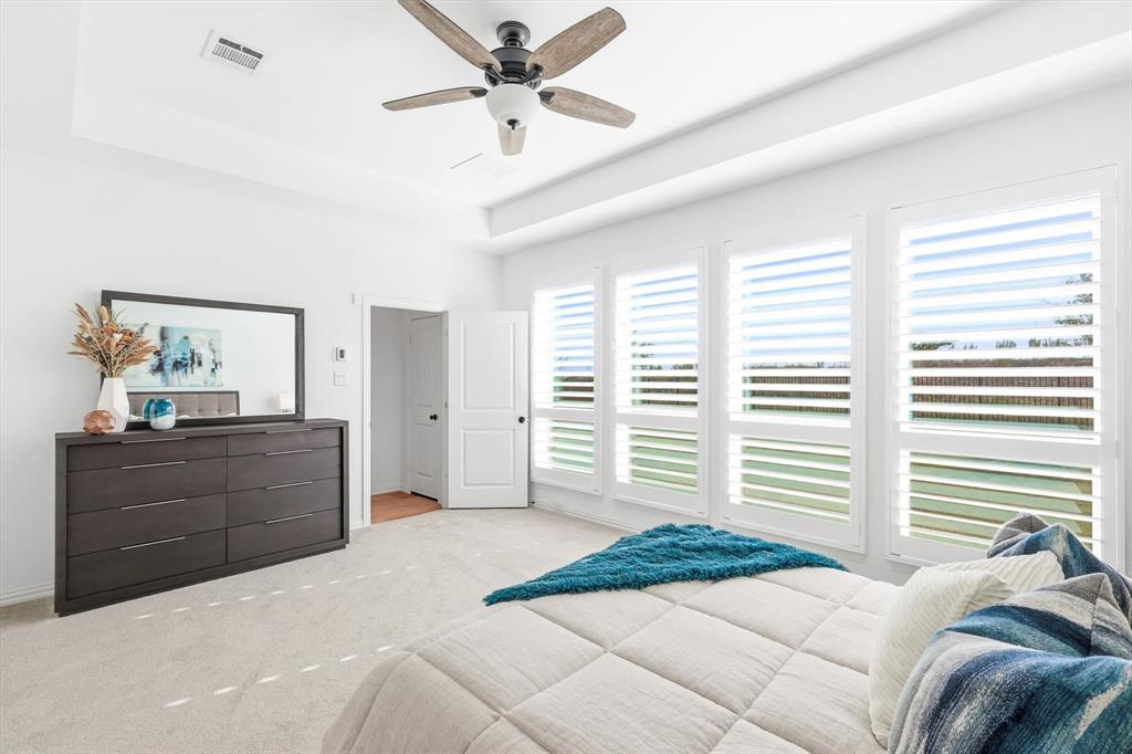 2171 Cloverfern Way Haslet, TX 76052 - Photo 15 of 38 a bed room with a bed and a window