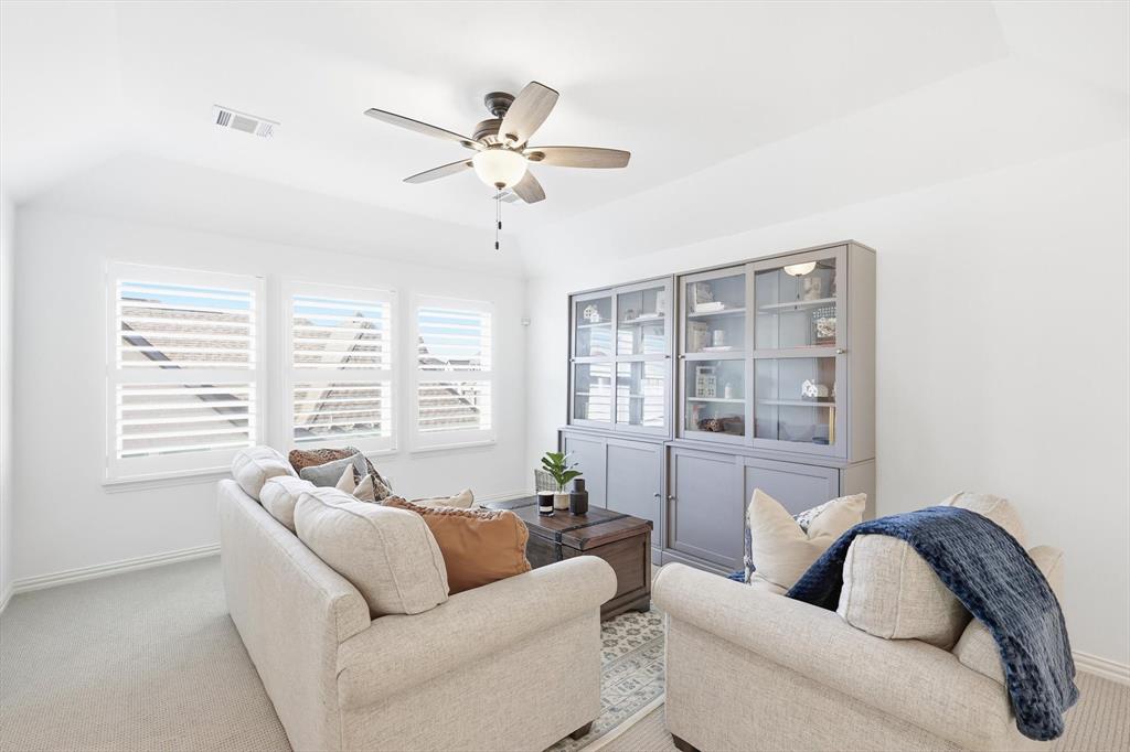 2171 Cloverfern Way Haslet, TX 76052 - Photo 22 of 38 a living room with furniture and a large window
