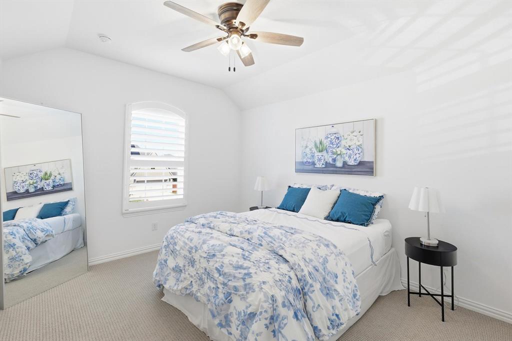 2171 Cloverfern Way Haslet, TX 76052 - Photo 25 of 38 a bedroom with a large bed and a window