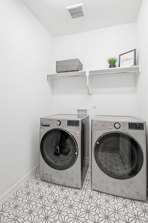 2171 Cloverfern Way Haslet, TX 76052 - Photo 28 of 38 a utility room with dryer and washer