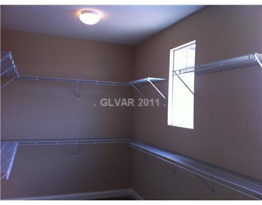 7116 Boomer Beach Street Las Vegas, NV 89166 - Photo 12 of 21 Other. Master Bedroom Closet