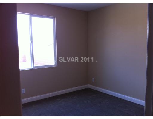 7116 Boomer Beach Street Las Vegas, NV 89166 - Photo 14 of 21 Other. Downstairs Bedroom