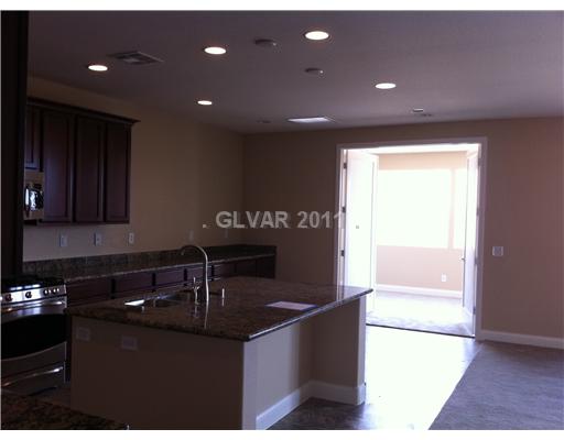 7116 Boomer Beach Street Las Vegas, NV 89166 - Photo 2 of 21 Other. Kitchen into Sunroom