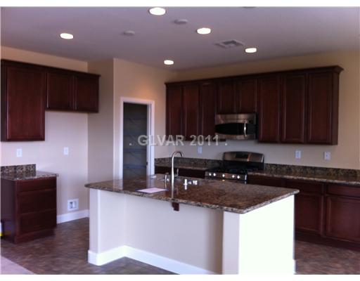 7116 Boomer Beach Street Las Vegas, NV 89166 - Photo 3 of 21 Kitchen.