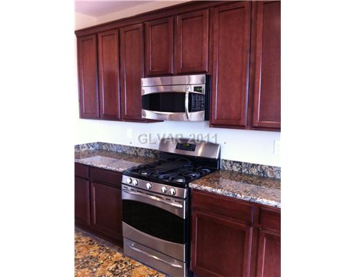 7116 Boomer Beach Street Las Vegas, NV 89166 - Photo 4 of 21 Kitchen.