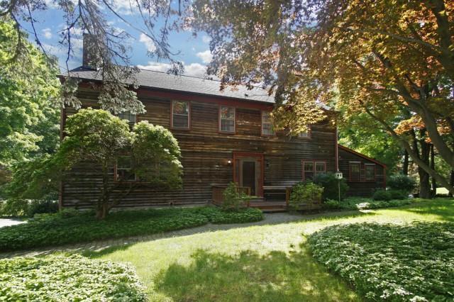 20 Wilton Road East Ridgefield, CT 06877 - Photo 1 of 1 a backyard of a house with lots of green space