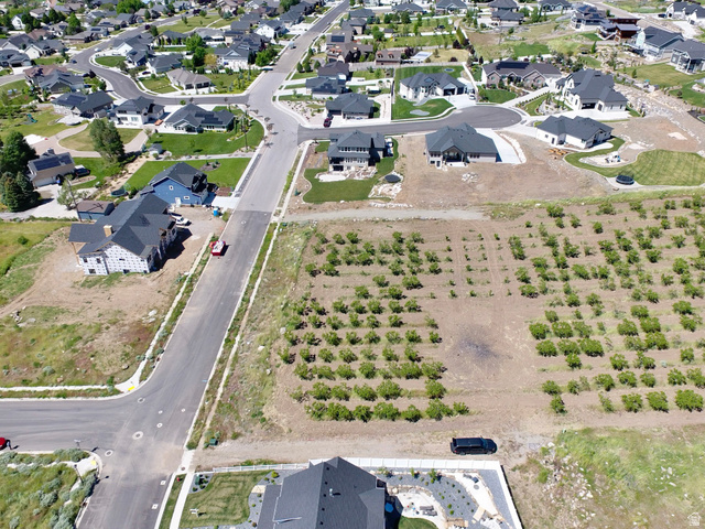 1985 South 100 West, Unit 16 Perry, UT 84302 - Photo 3 of 7 Aerial view of a residential development featuring established homes and new construction