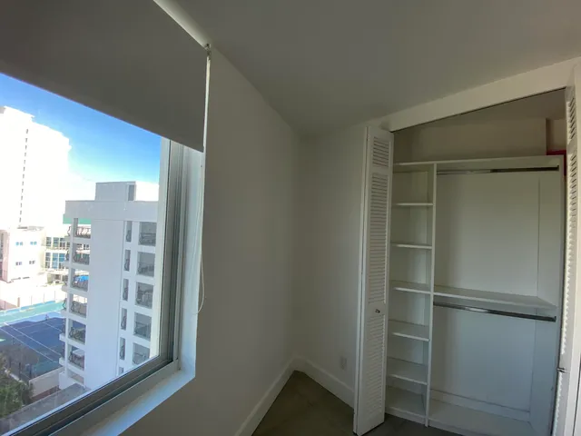 a bathroom with a bathtub and toilet