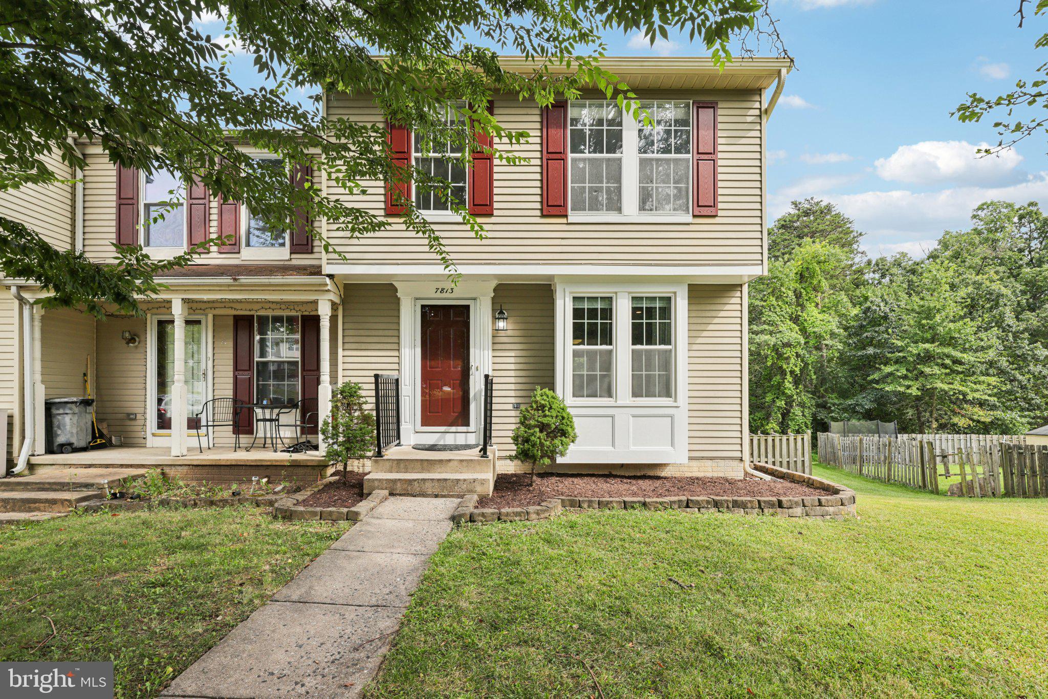 7813 Paddock Way Windsor Mill, MD 21244 - Photo 1 of 30 front view of a house with a yard