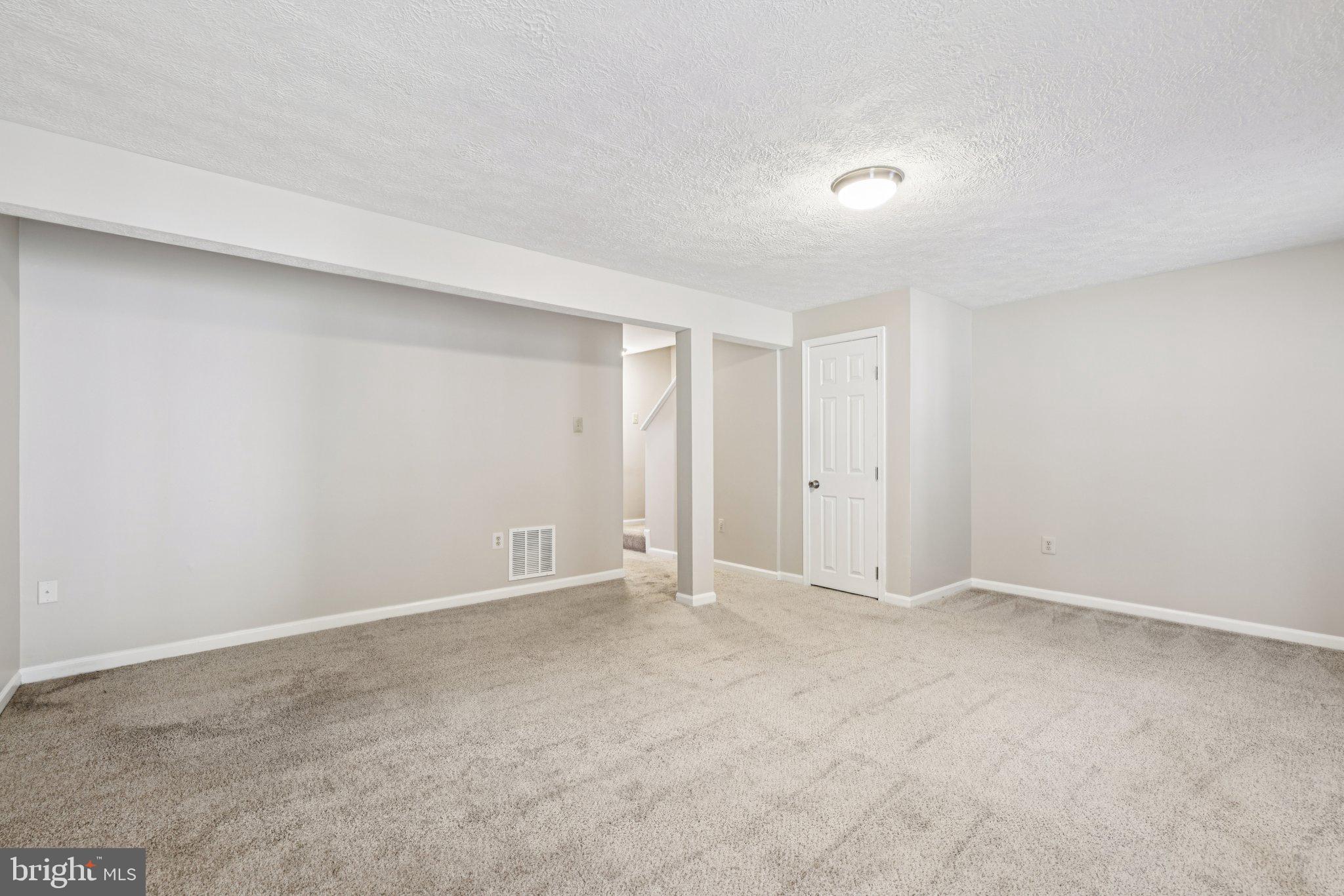 7813 Paddock Way Windsor Mill, MD 21244 - Photo 18 of 30 a view of an empty room