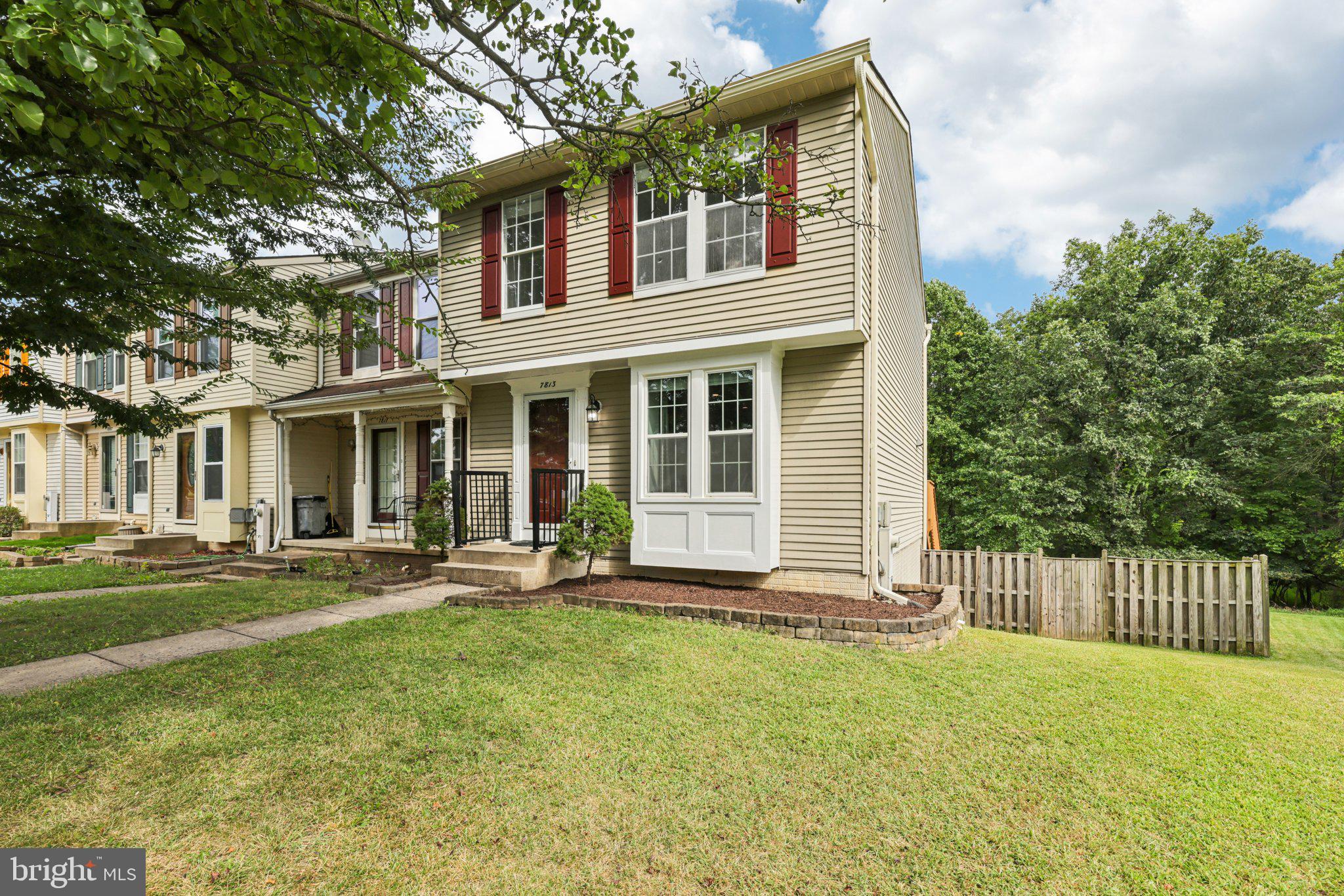 7813 Paddock Way Windsor Mill, MD 21244 - Photo 2 of 30 a front view of a house with a garden