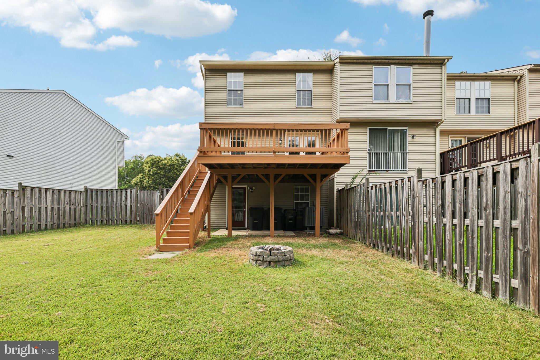 7813 Paddock Way Windsor Mill, MD 21244 - Photo 24 of 30 a view of a house with wooden fence