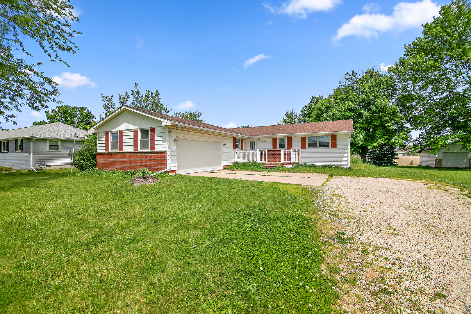 1572 North 2000E Road Bourbonnais, IL 60914 - Photo 1 of 18 a view of house with a big yard and large trees