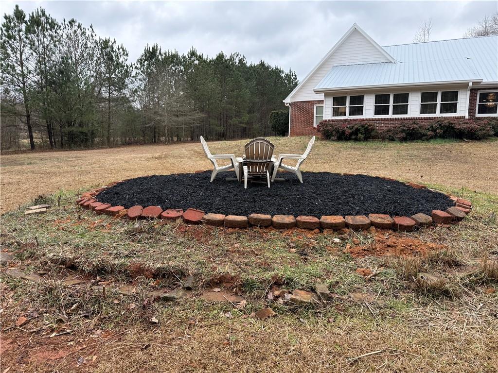 3280 Stanton Road Southeast Conyers, GA 30094 - Photo 11 of 49 a view of a house with a yard