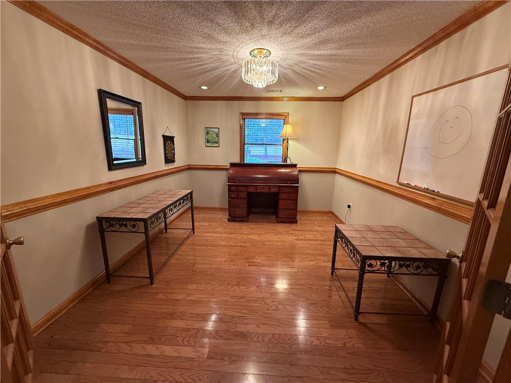 3280 Stanton Road Southeast Conyers, GA 30094 - Photo 28 of 49 a living room with furniture and a wooden floor