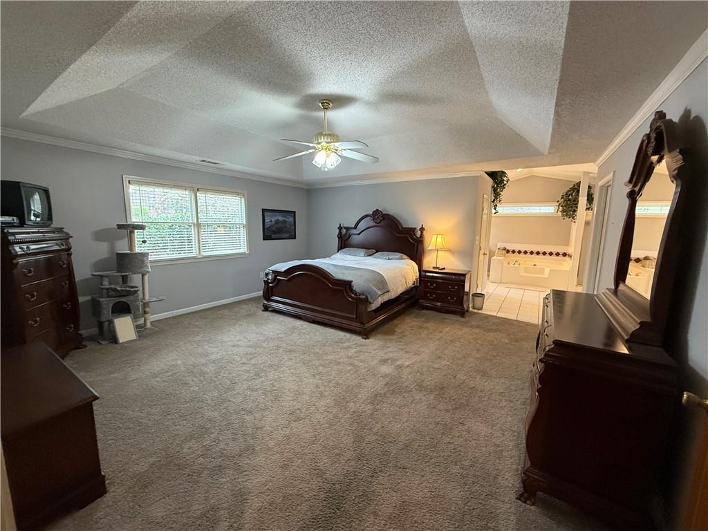 3280 Stanton Road Southeast Conyers, GA 30094 - Photo 31 of 49 a bed room with a bed window and a television
