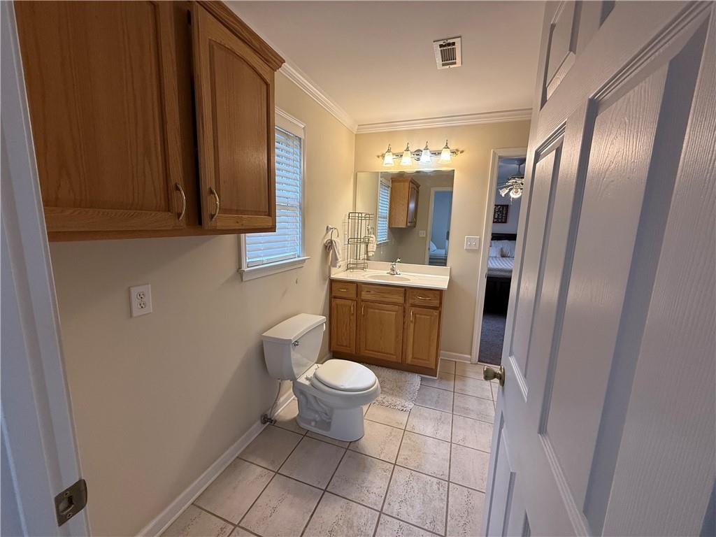 3280 Stanton Road Southeast Conyers, GA 30094 - Photo 37 of 49 a bathroom with a sink toilet and shower