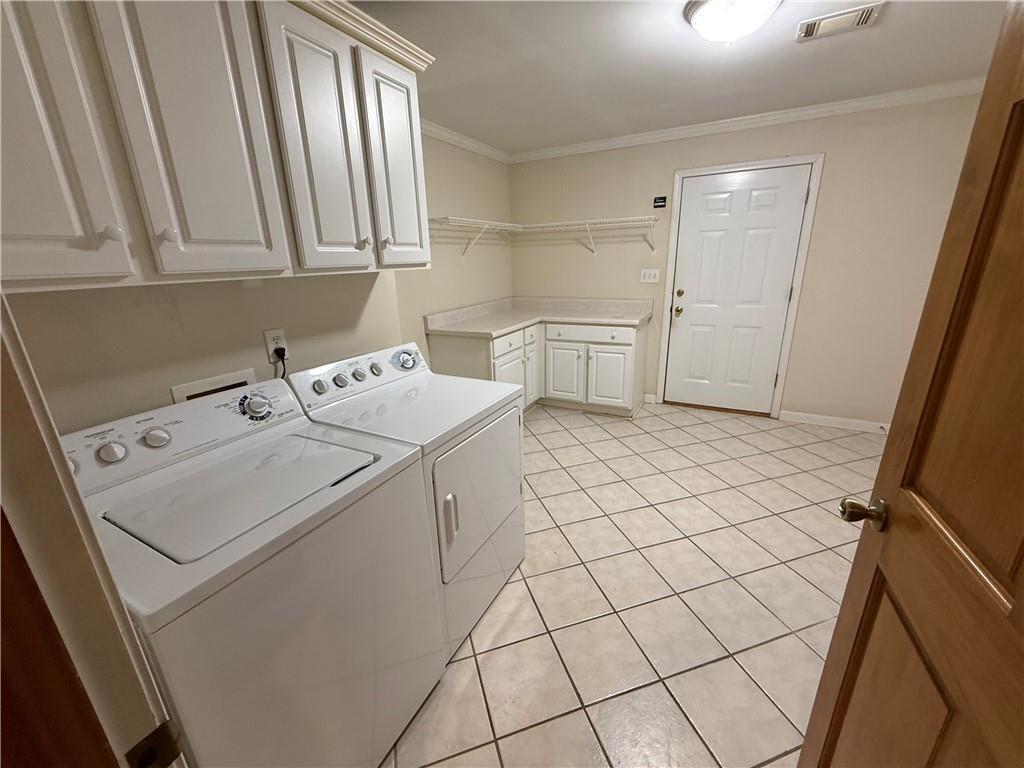 3280 Stanton Road Southeast Conyers, GA 30094 - Photo 44 of 49 a utility room with dryer and washer