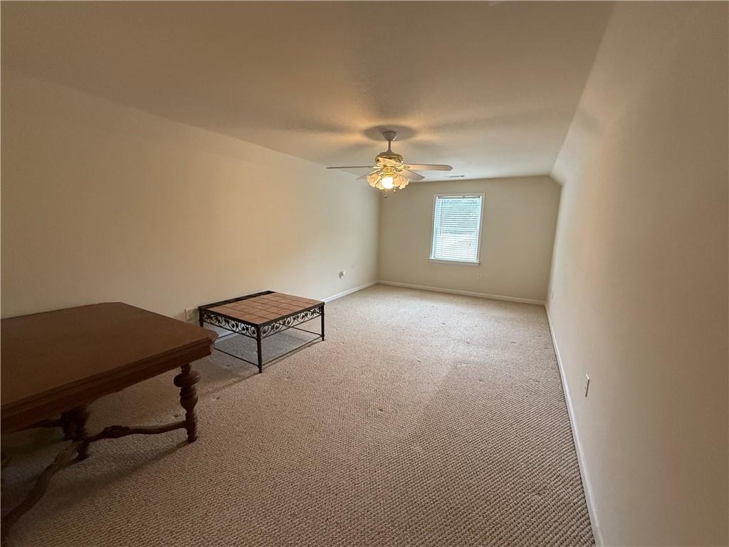 3280 Stanton Road Southeast Conyers, GA 30094 - Photo 46 of 49 a living room with furniture and a window