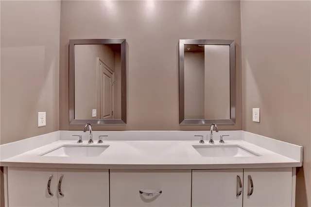 a view of a livingroom and a bathroom