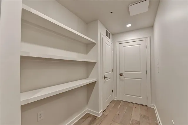 an aerial view of residential house with outdoor space and swimming pool