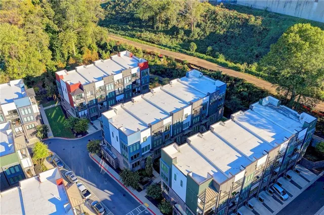 a view of a living room and a balcony