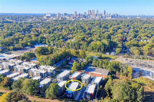 a view of a car parked in front of a building