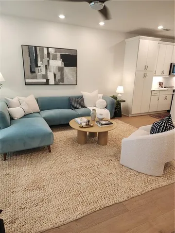 a view of a swimming pool and lounge chair