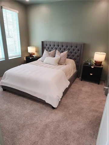 a view of a pathway with house on both side