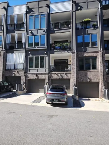 a car parked in front of a building