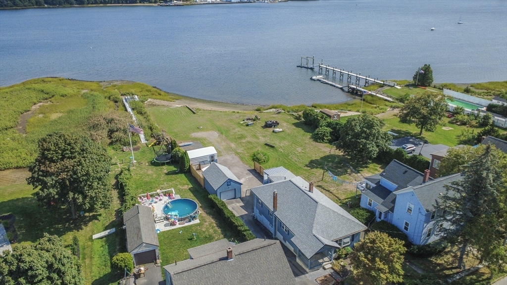 2714 Riverside Avenue Somerset, MA 02726 - Photo 2 of 36 an aerial view of a house with a yard