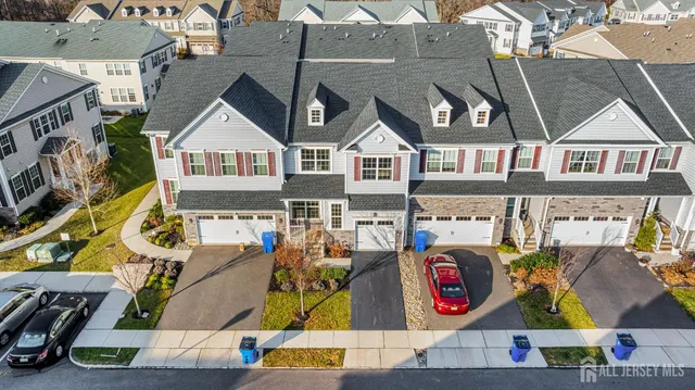 a front view of a house with yard
