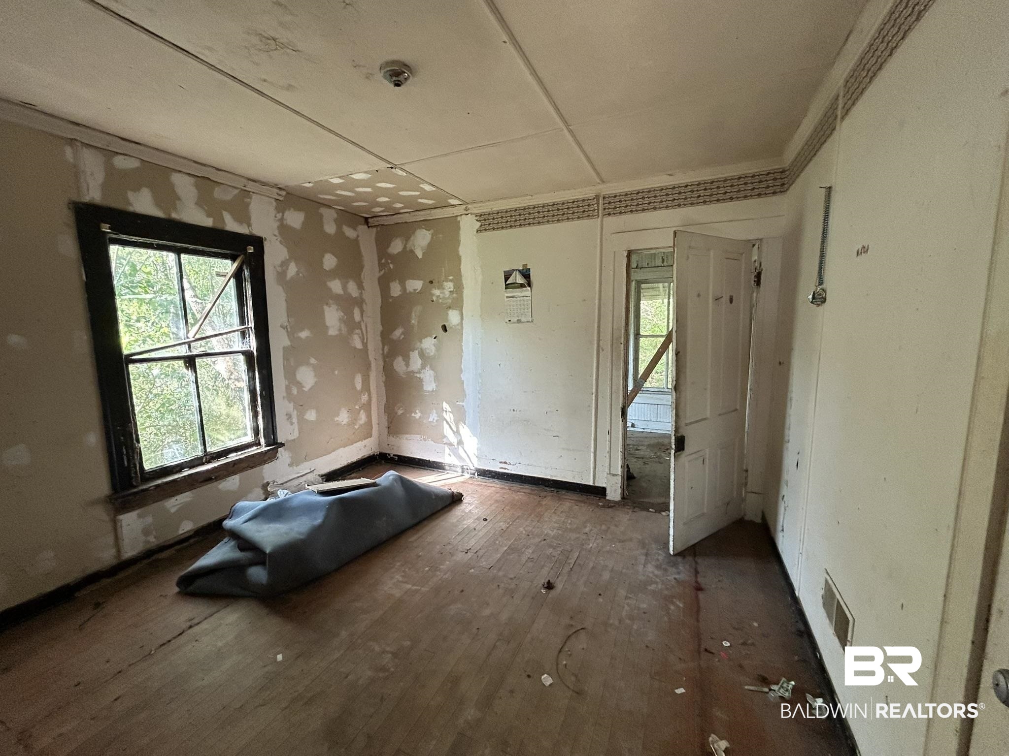 3142 West Turner Road Mobile, AL 36612 - Photo 12 of 19 Interior space with hardwood / wood-style flooring and visible vents
