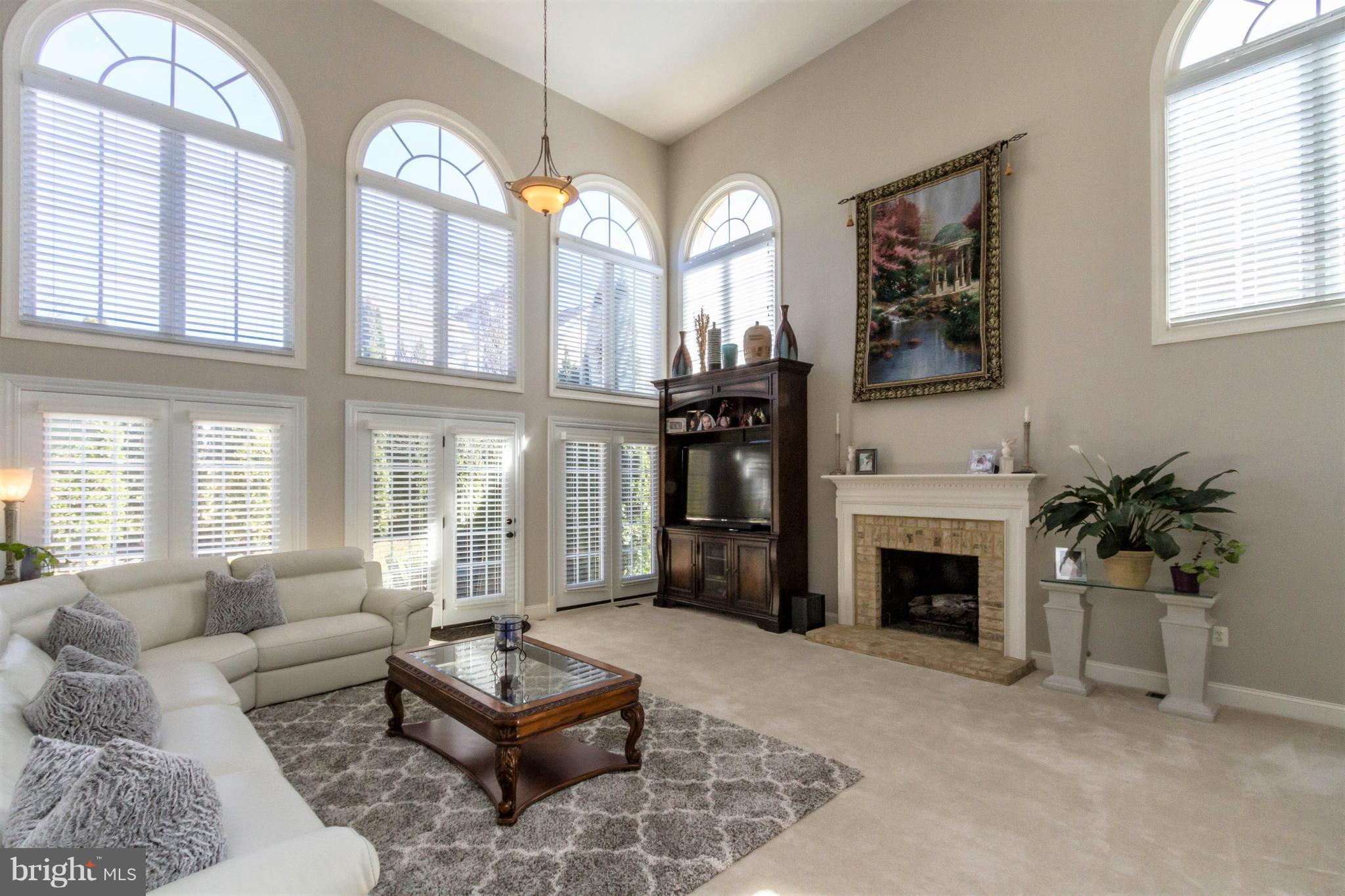 8247 Roxborough Loop Gainesville, VA 20155 - Photo 13 of 30 Walls of Windows provide Abundant Natural Light