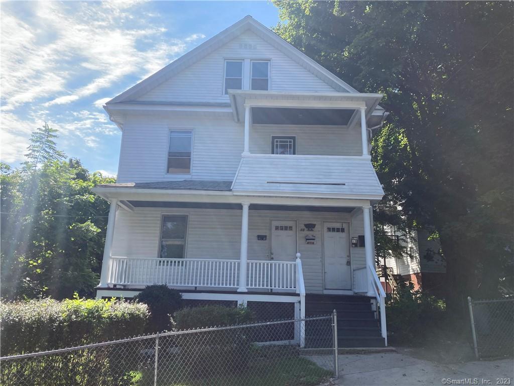 13 Crescent Street, Unit 3 Ansonia, CT 06401 - Photo 1 of 1 a front view of a house with a porch