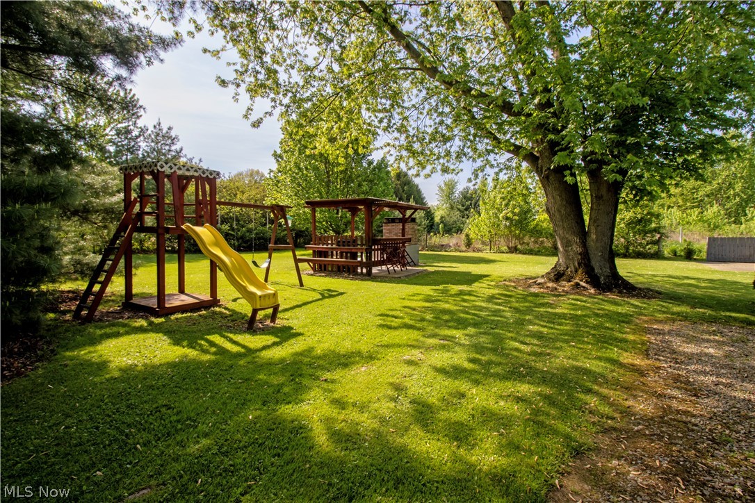 9360 Zimmerman Road Wooster, OH 44691 - Photo 31 of 33 View of playground featuring a lawn