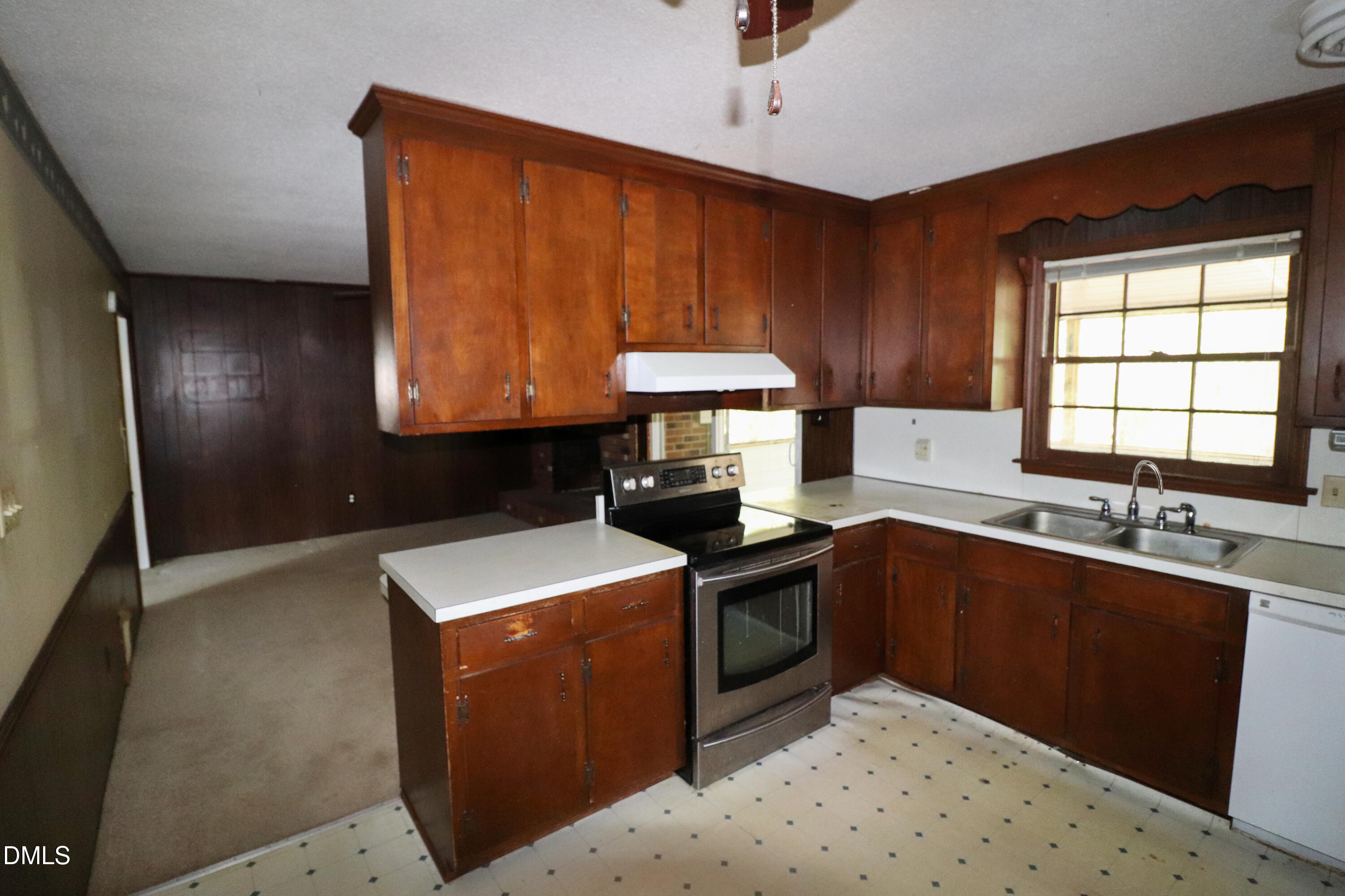 163 Walton Road Youngsville, NC 27596 - Photo 11 of 45 a kitchen with a sink stove and refrigerator