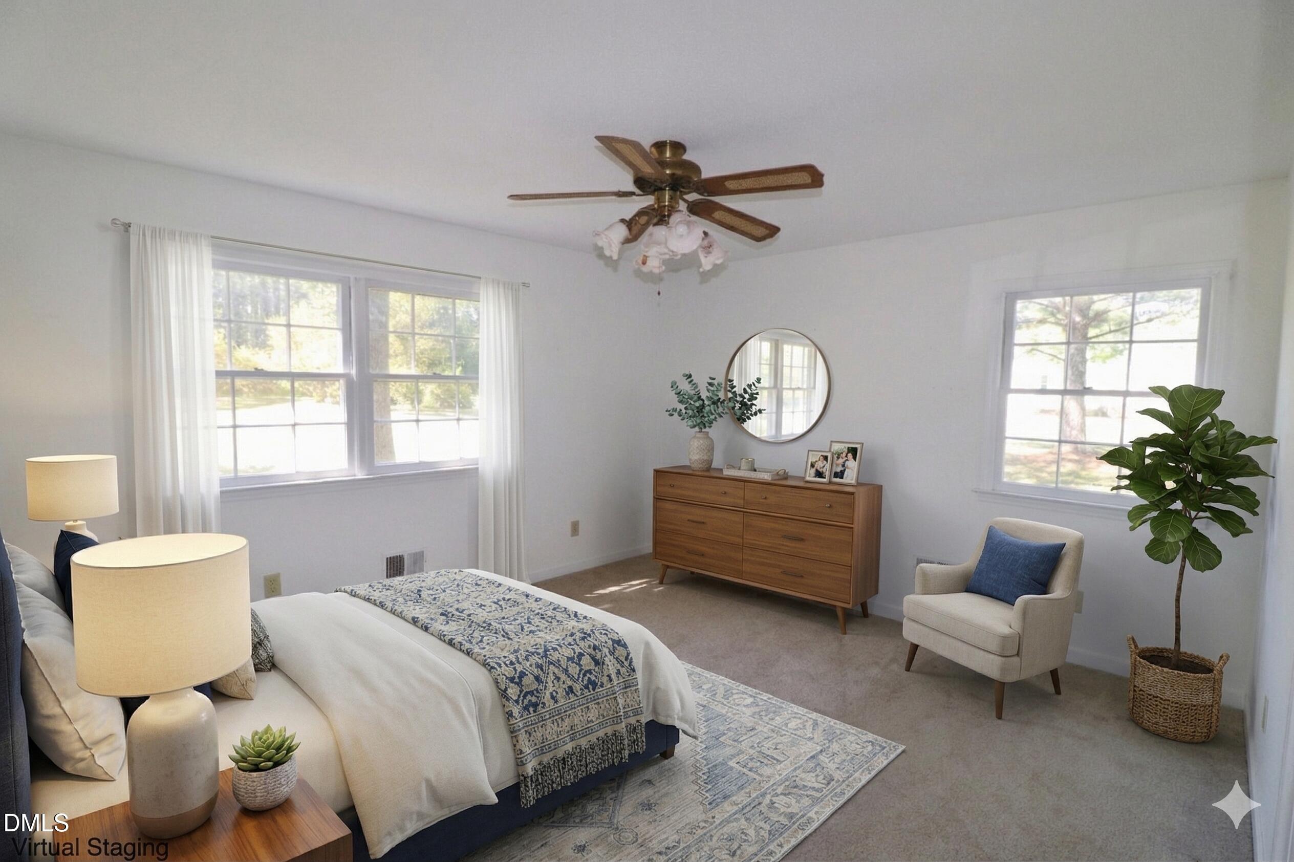 163 Walton Road Youngsville, NC 27596 - Photo 18 of 45 a bedroom with bed and a window