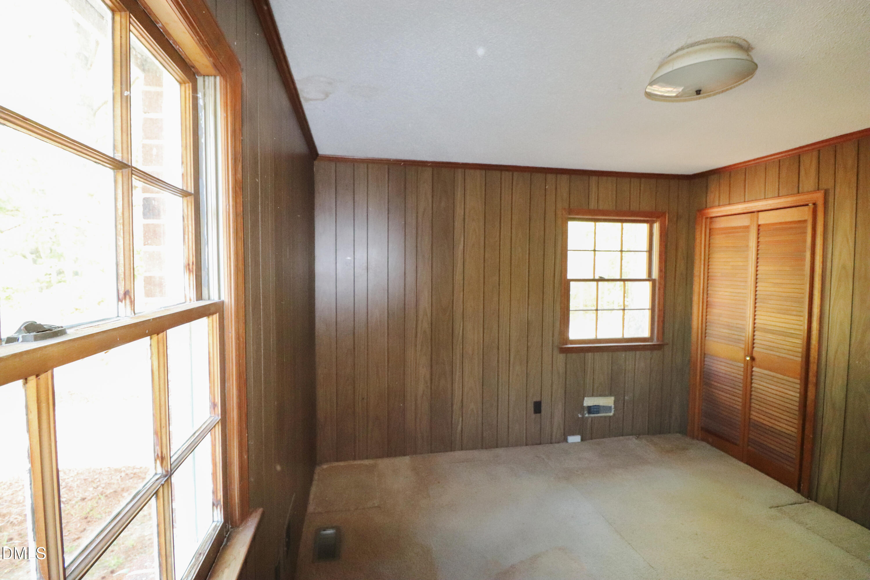 163 Walton Road Youngsville, NC 27596 - Photo 30 of 45 a view of an empty room with a window