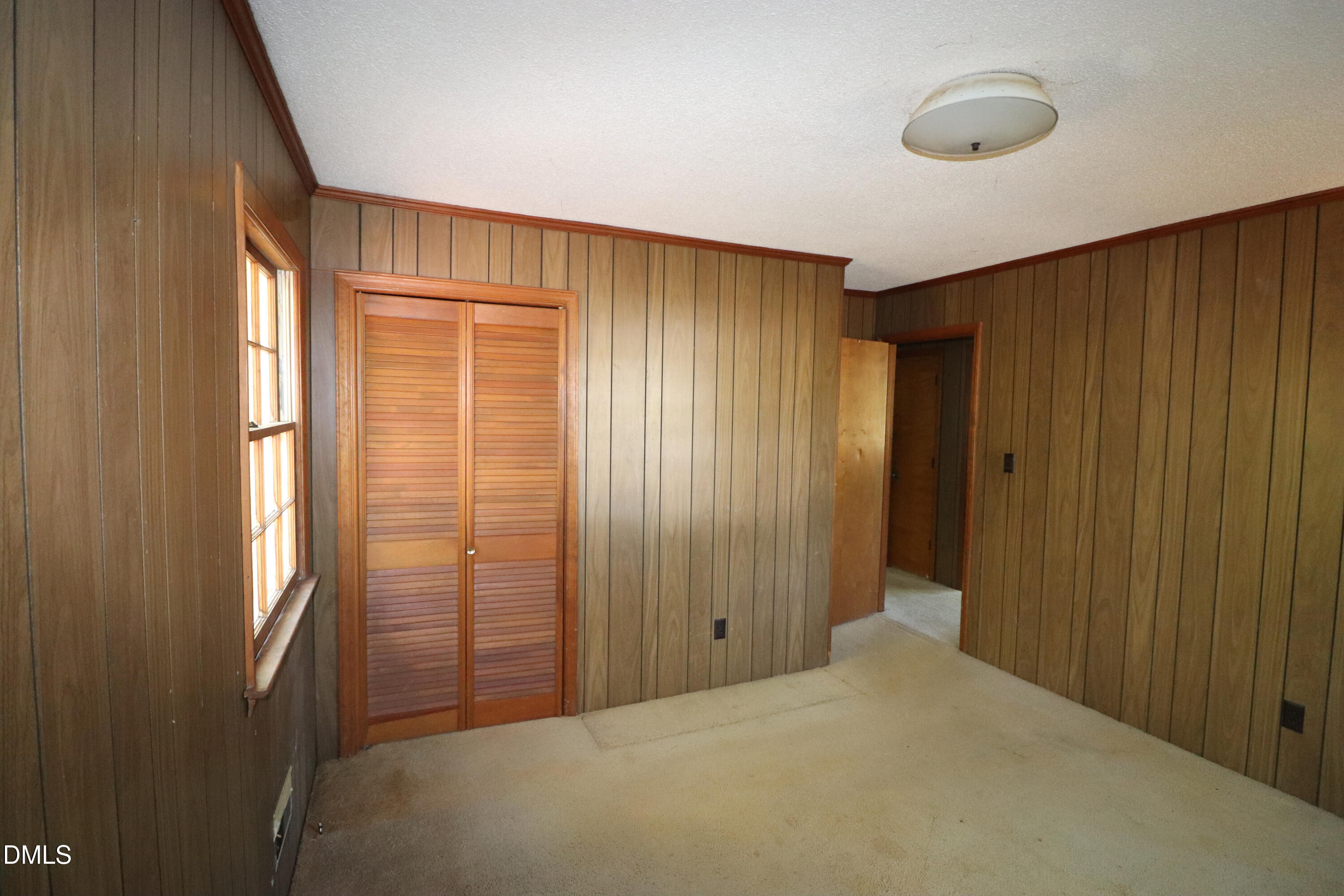 163 Walton Road Youngsville, NC 27596 - Photo 31 of 45 a view of a livingroom with an entryway
