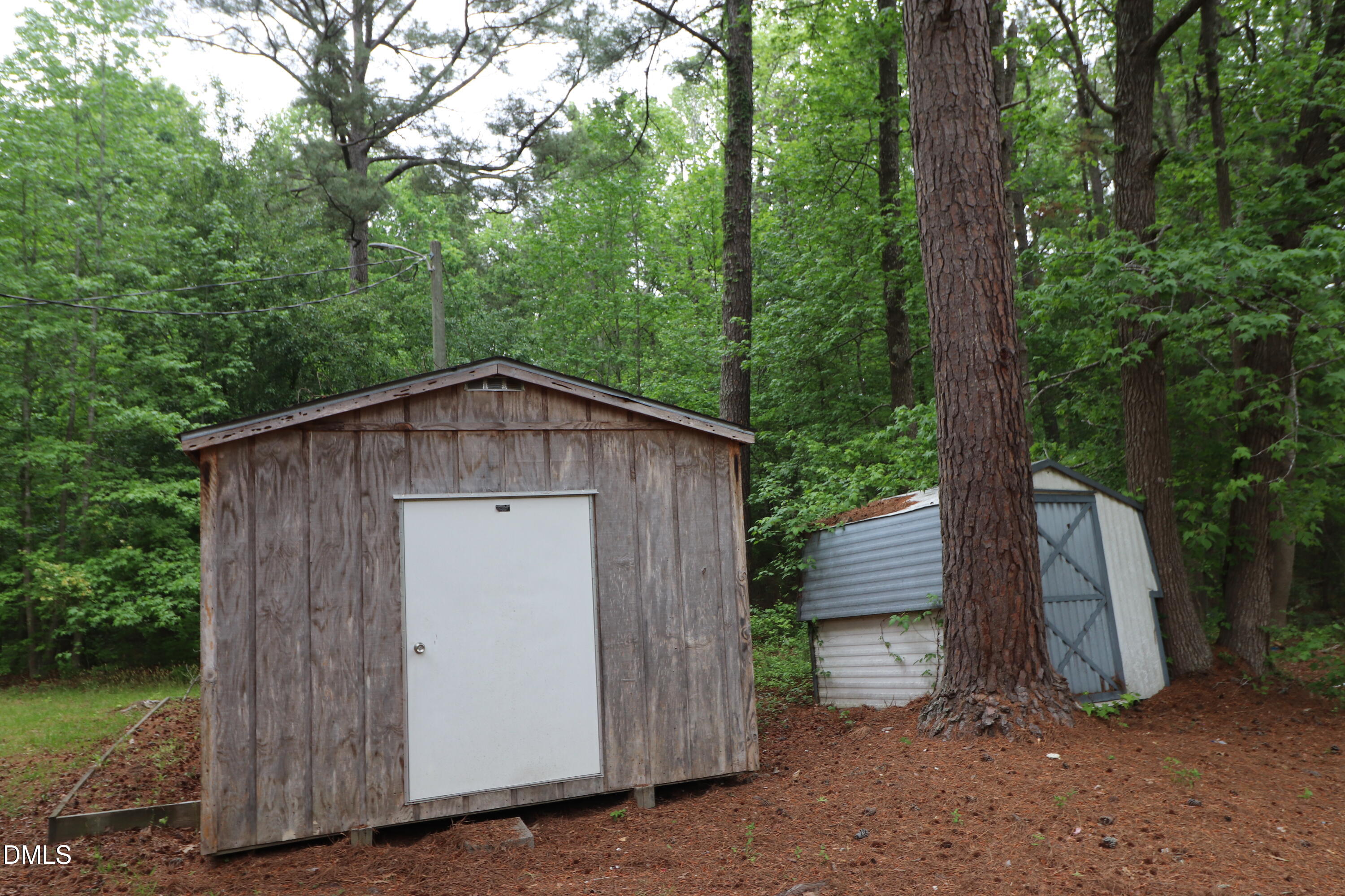 163 Walton Road Youngsville, NC 27596 - Photo 36 of 45 a barn house with a outdoor space