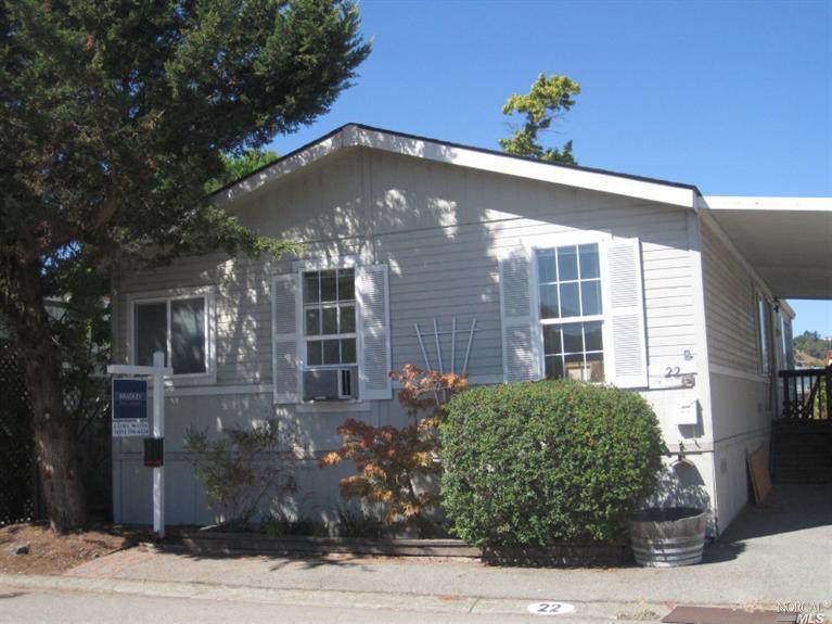 22 Yosemite Road, Unit 22 San Rafael, CA 94903 - Photo 1 of 1 a front view of a house with a yard