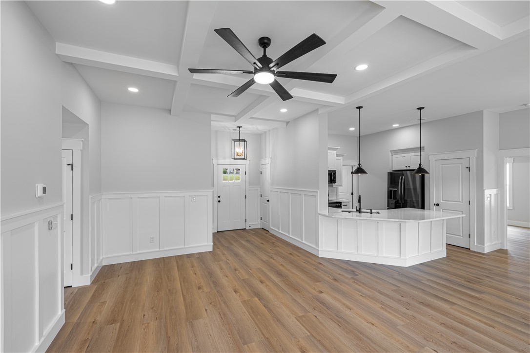 105 Leon Drive Anderson, SC 29621 - Photo 21 of 46 This bright, open concept living area seamlessly connects to a modern kitchen.