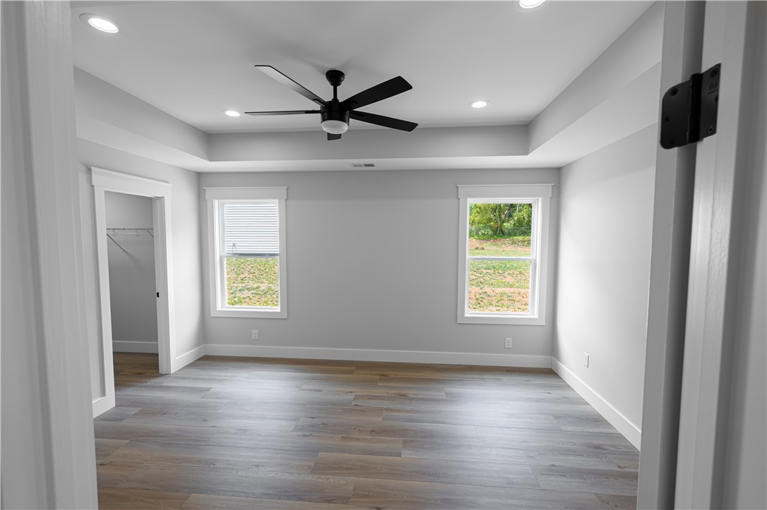 105 Leon Drive Anderson, SC 29621 - Photo 27 of 46 Bright and airy, this room features durable flooring and ample natural light, ideal for peaceful living.