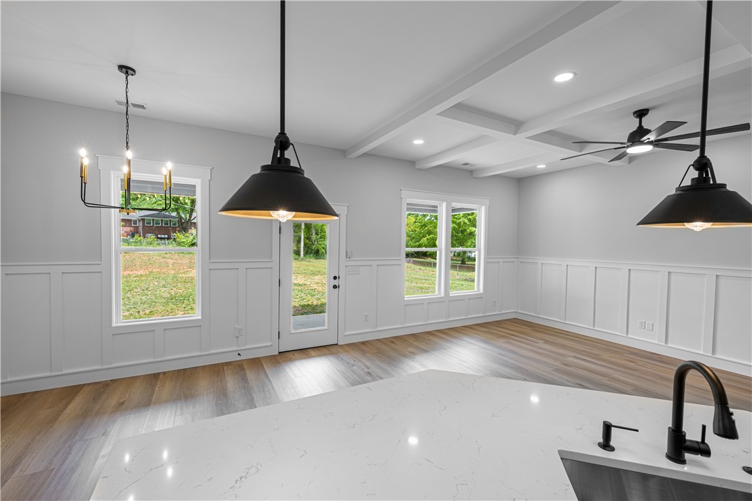 105 Leon Drive Anderson, SC 29621 - Photo 28 of 46 Bright and open interior featuring elegant wainscoting and natural light, perfect for everyday living.