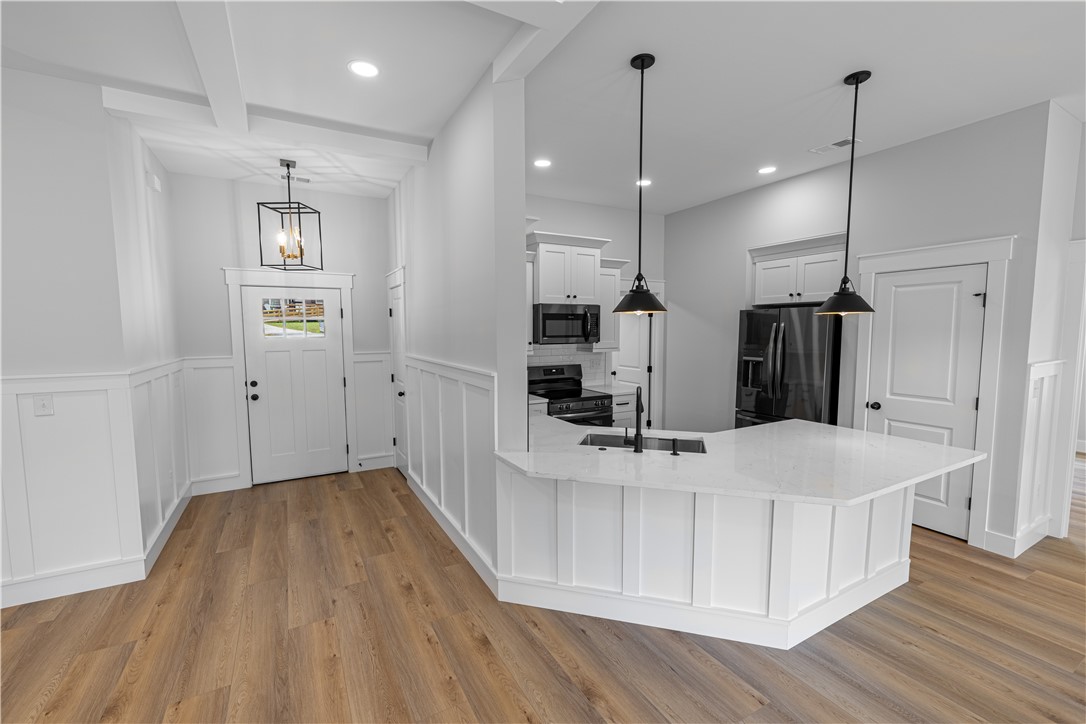 105 Leon Drive Anderson, SC 29621 - Photo 30 of 46 This newly constructed home features a well-appointed kitchen and inviting entryway with modern design.